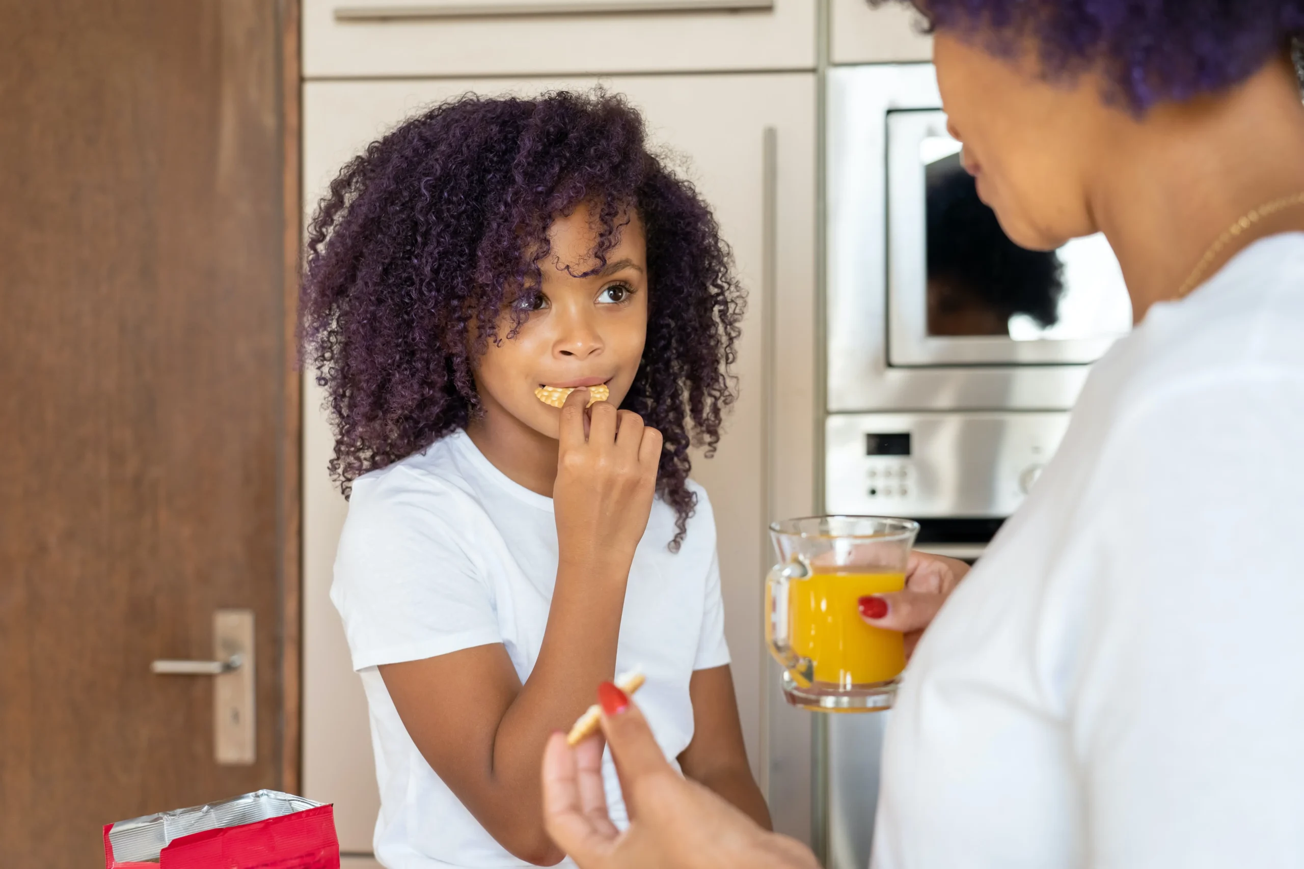 child eating crackers